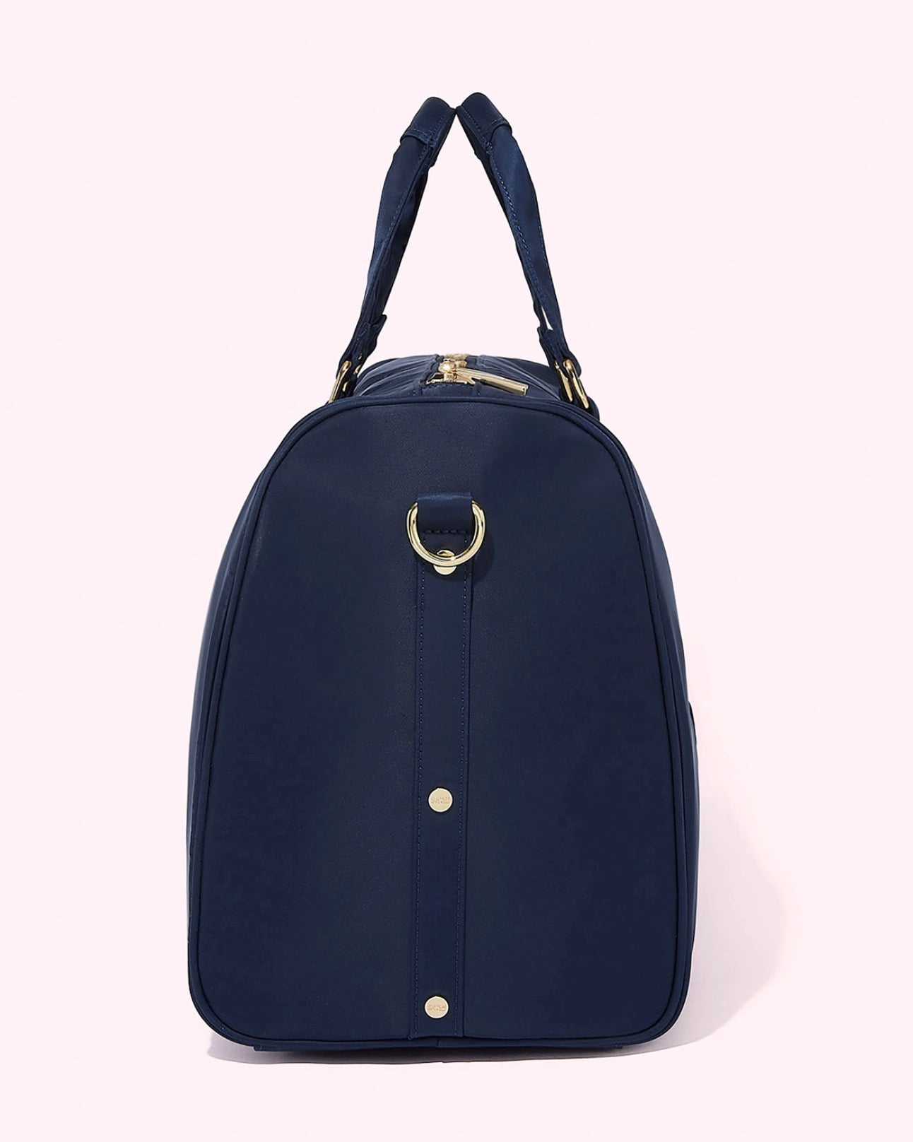 Navy blue duffel bag with gold accents by Stoney Clover Lane