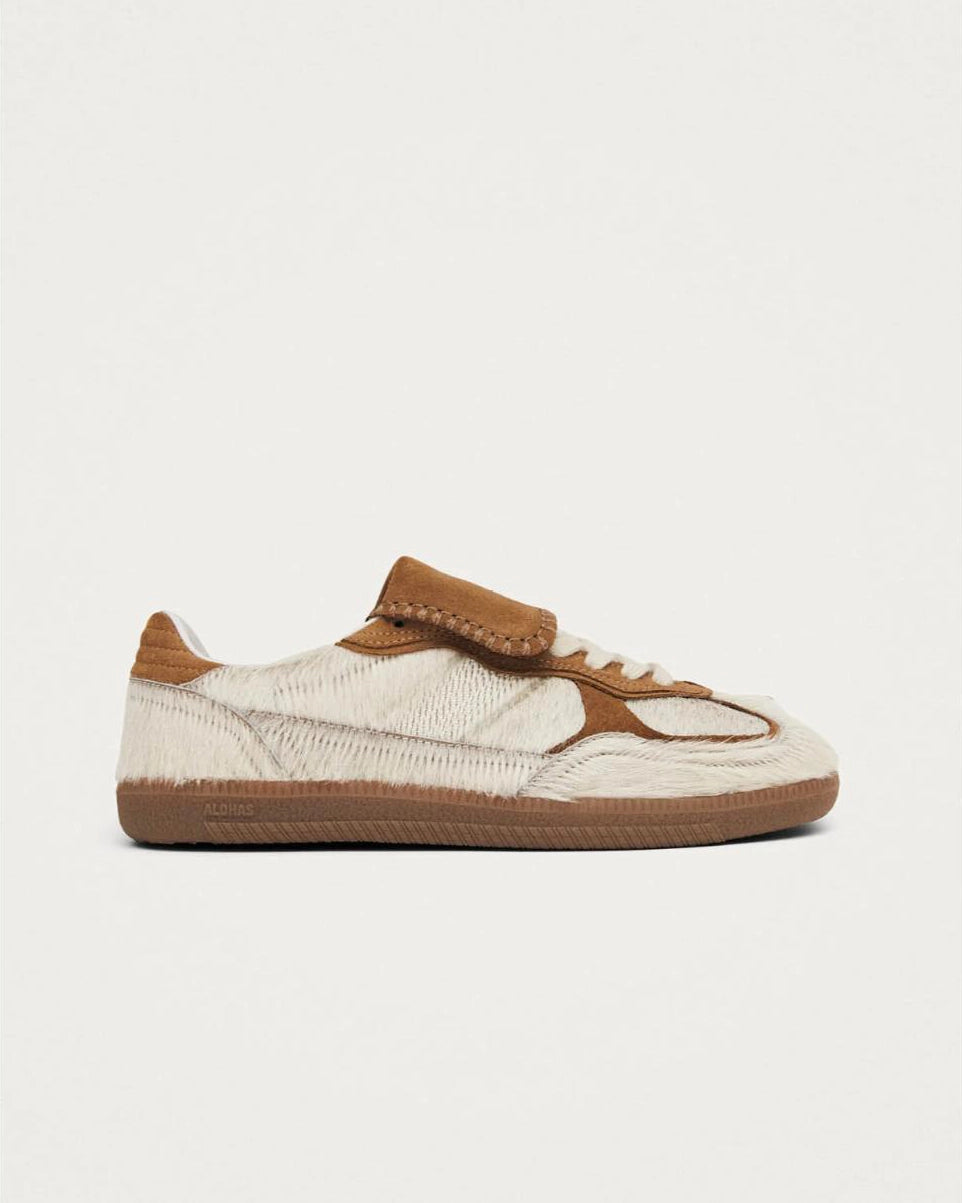 pony hair cream and tan leather sneaker with a rubber sole