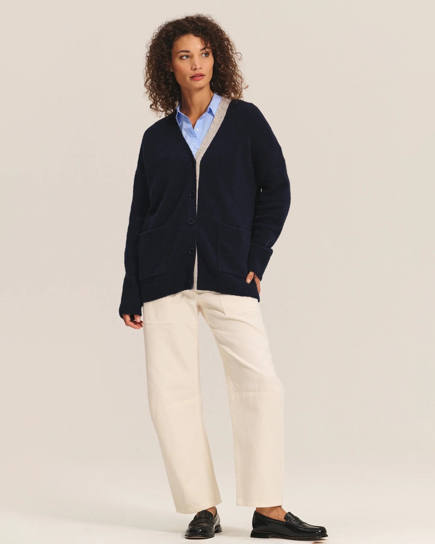 A woman wearing beige cotton pants