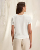 Woman wearing a white cotton slub t-shirt