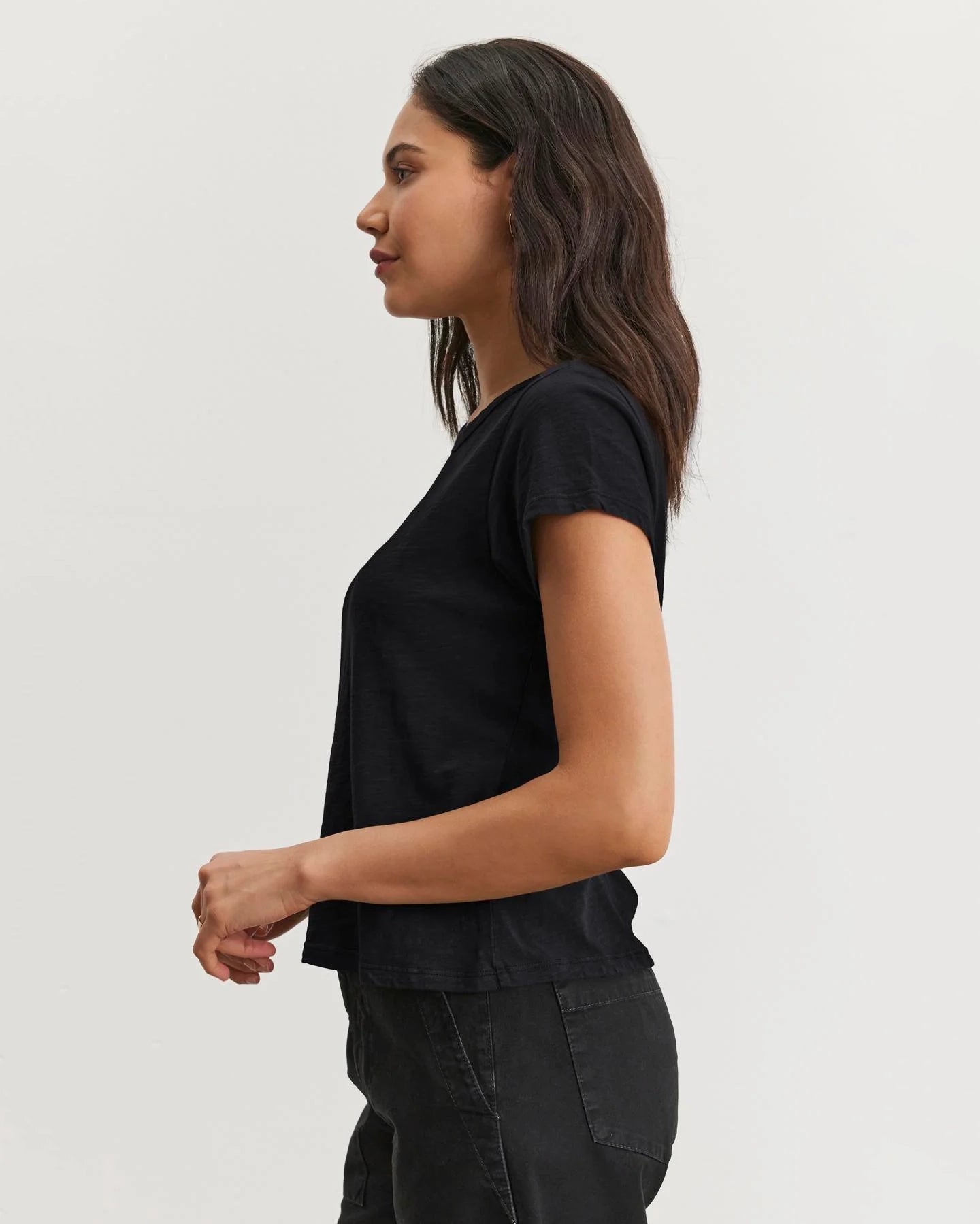 Woman wearing a black cotton slub t-shirt