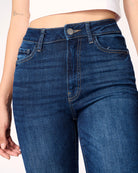 woman wearing skinny blue jeans in medium wash