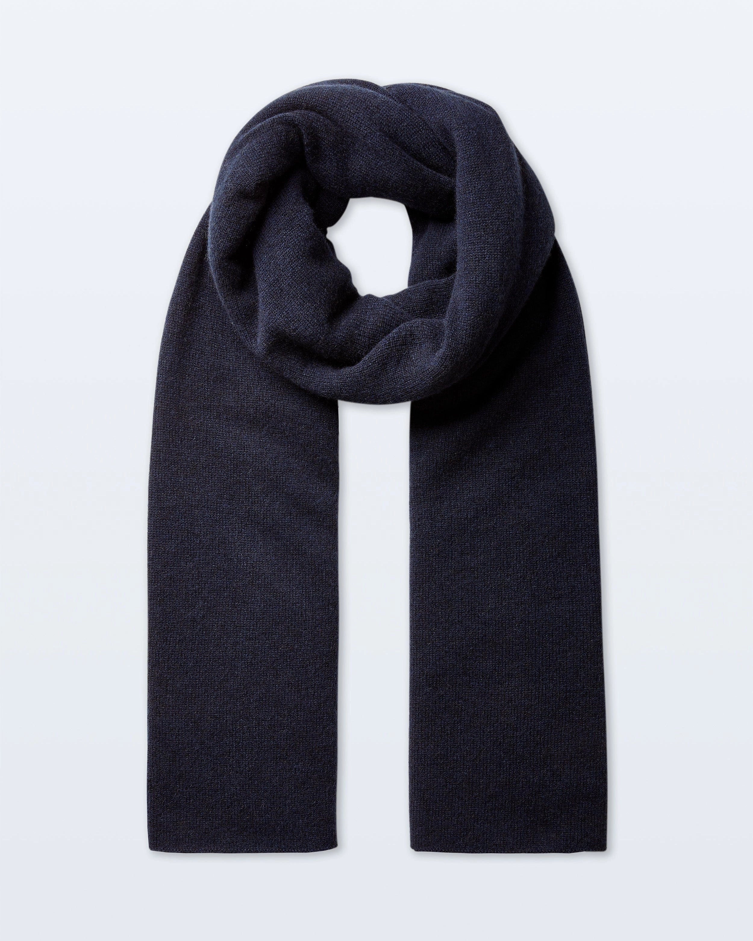 a large cashmere travel wrap scarf in navy blue