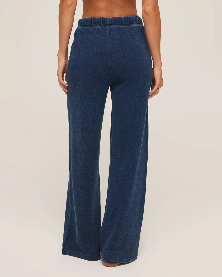 woman wears a blue drawstring denim pant by Z Supply