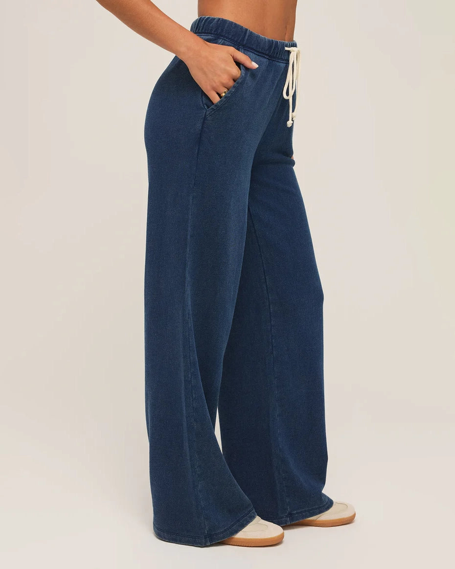 woman wears a blue drawstring denim pant by Z Supply