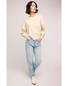 beige crewneck sweatshirt