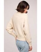 beige crewneck sweatshirt