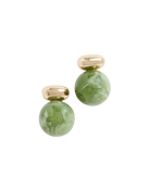 gold earring with a green gemstone hanging