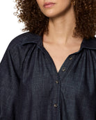 denim mini dress in a dark washed blue