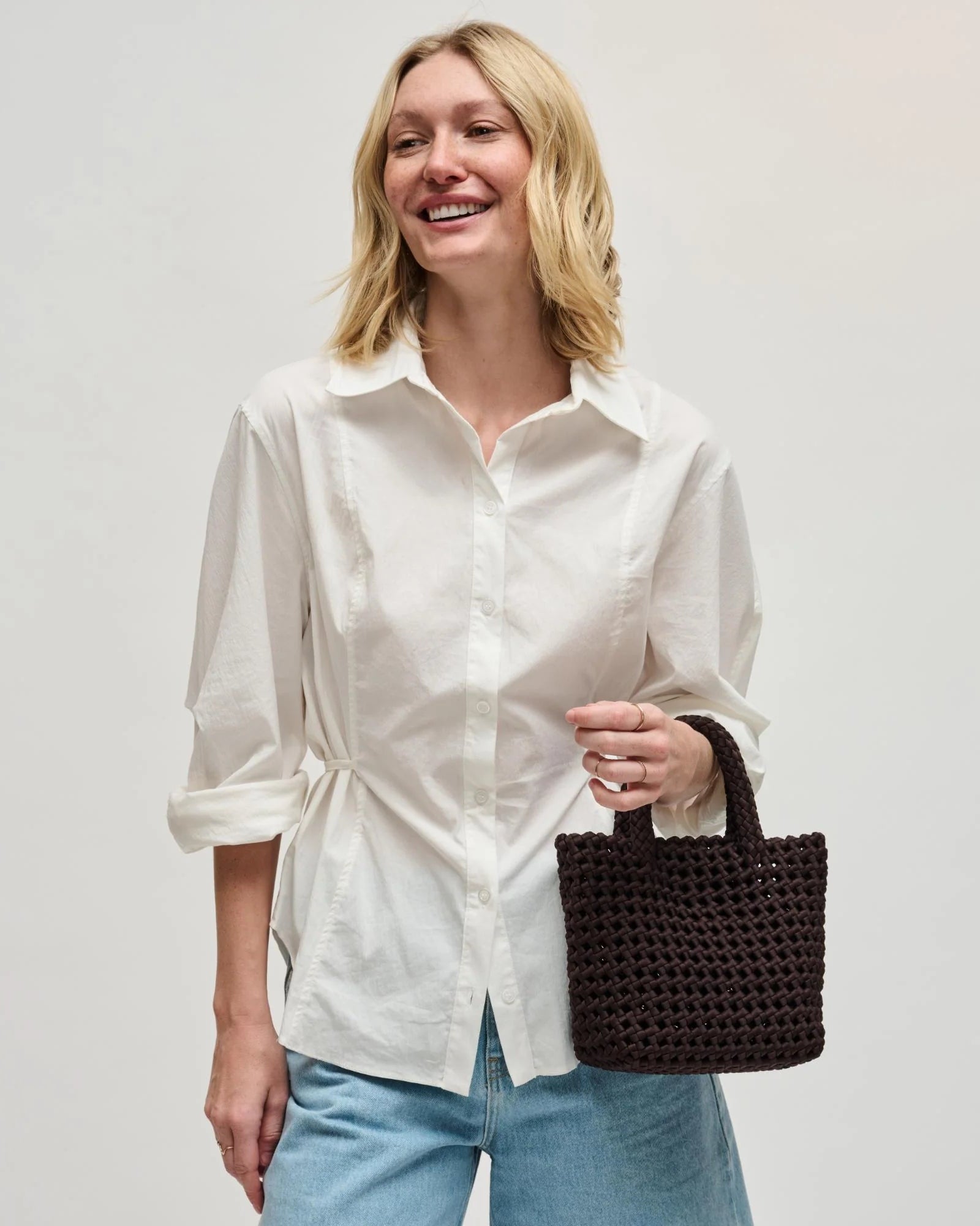 brown woven crossbody or handbag