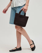 brown woven crossbody or handbag