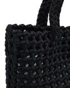 black woven crossbody or hand bag