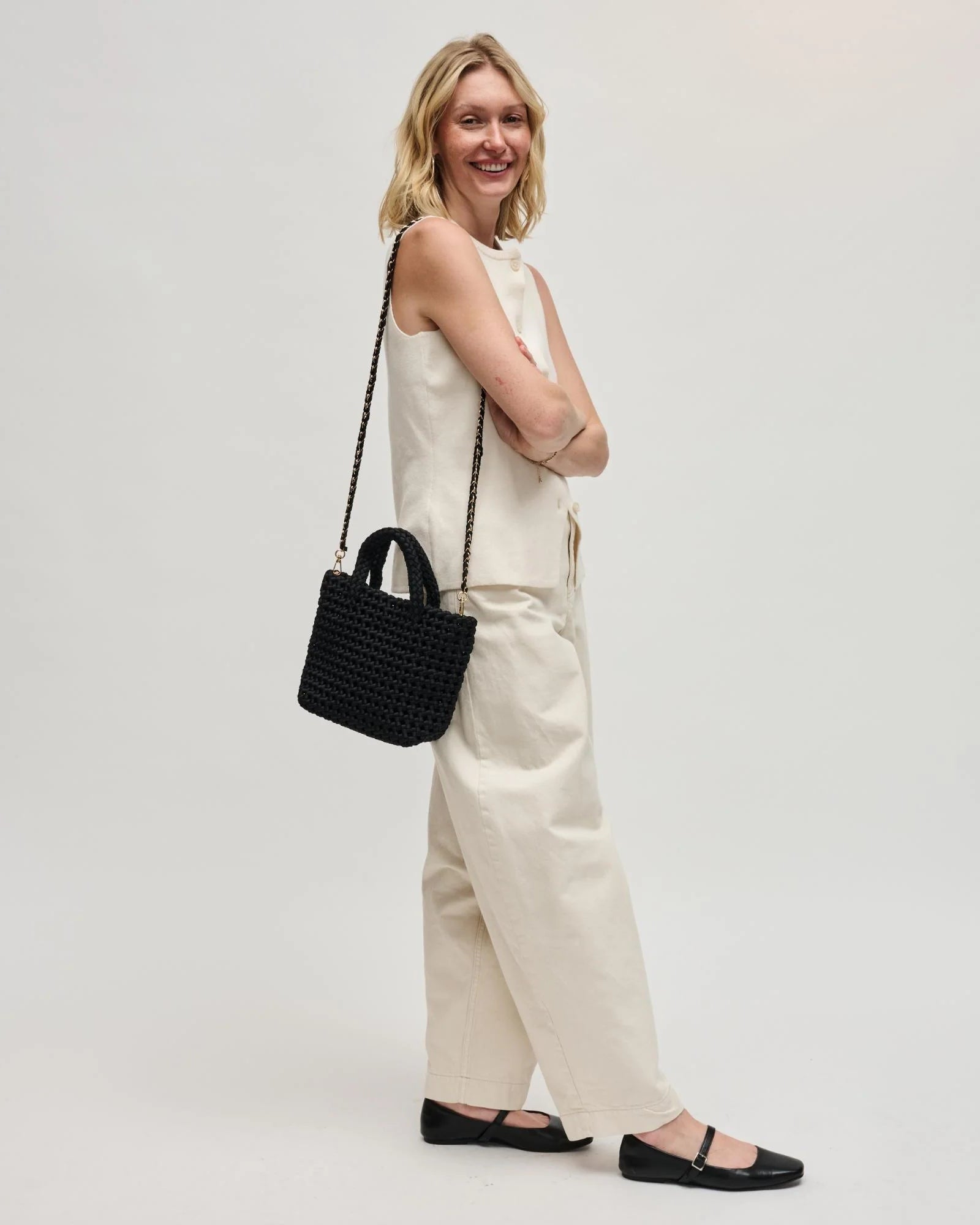 black woven crossbody or hand bag
