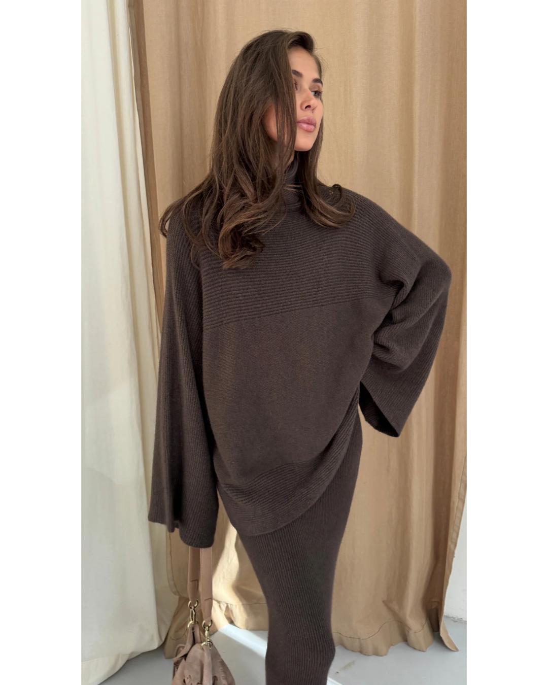 dark brown turtleneck sweater with an oversized look