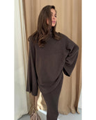dark brown turtleneck sweater with an oversized look