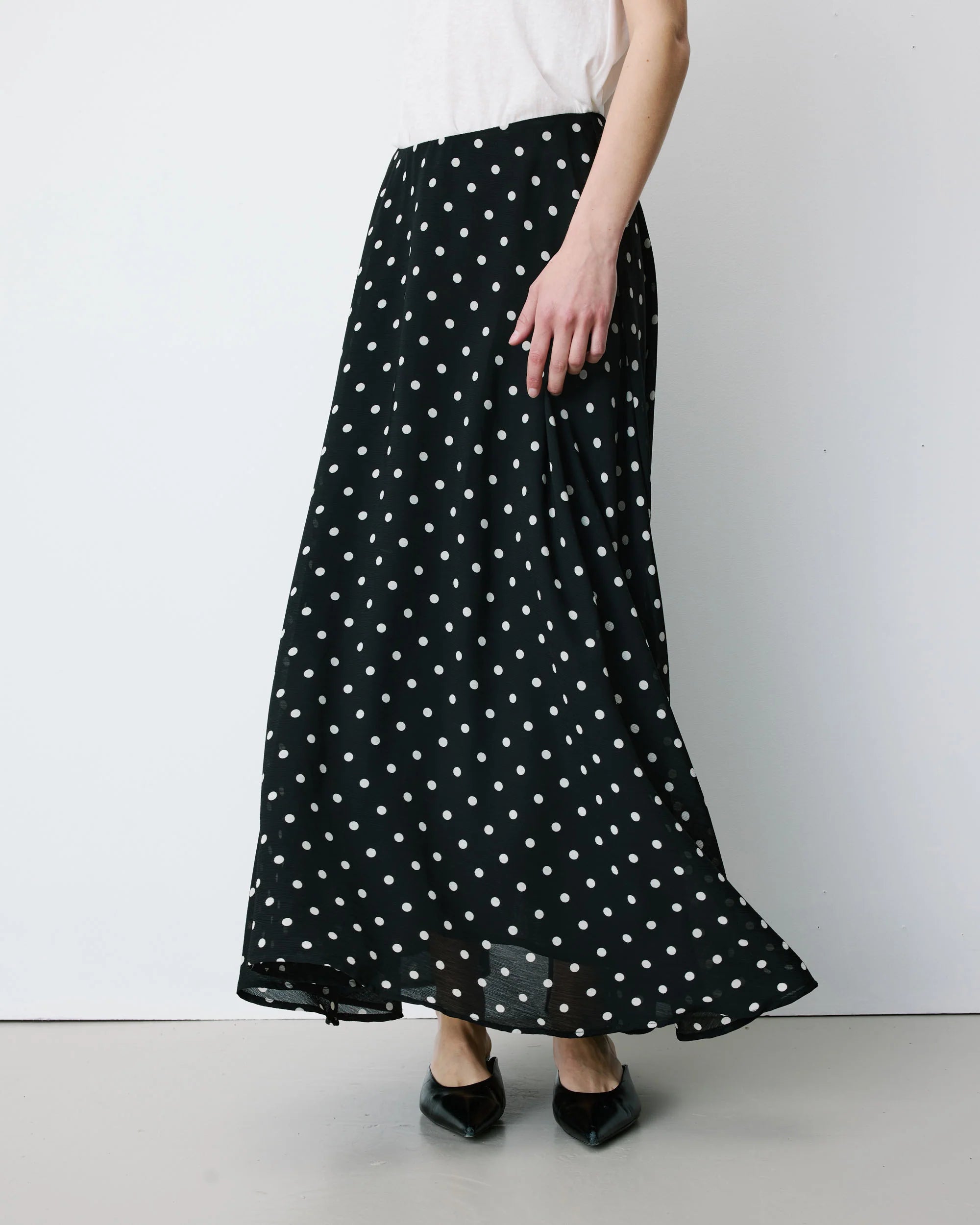 midi black skirt with white polka dots