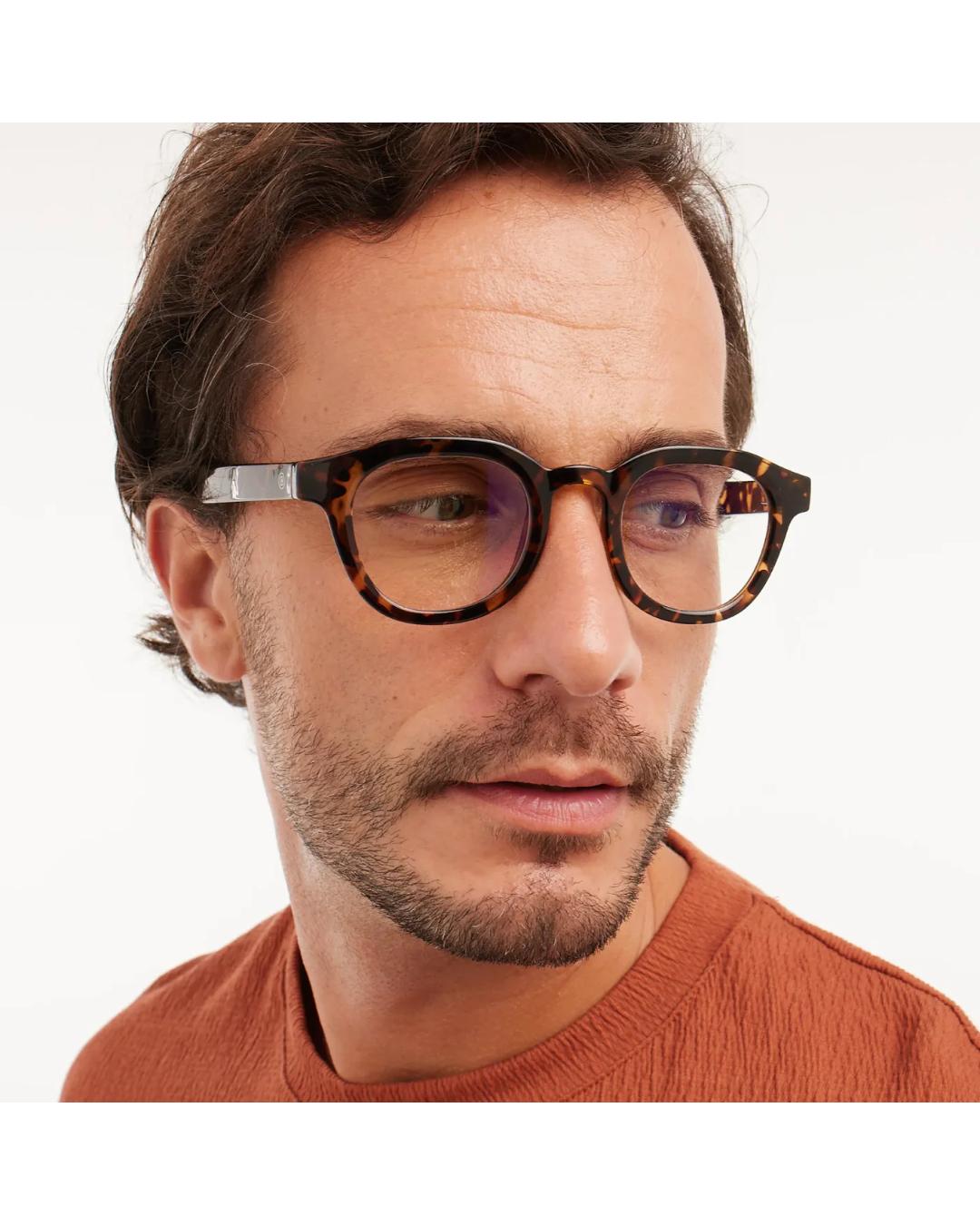 eyeglasses with a tortoise frame