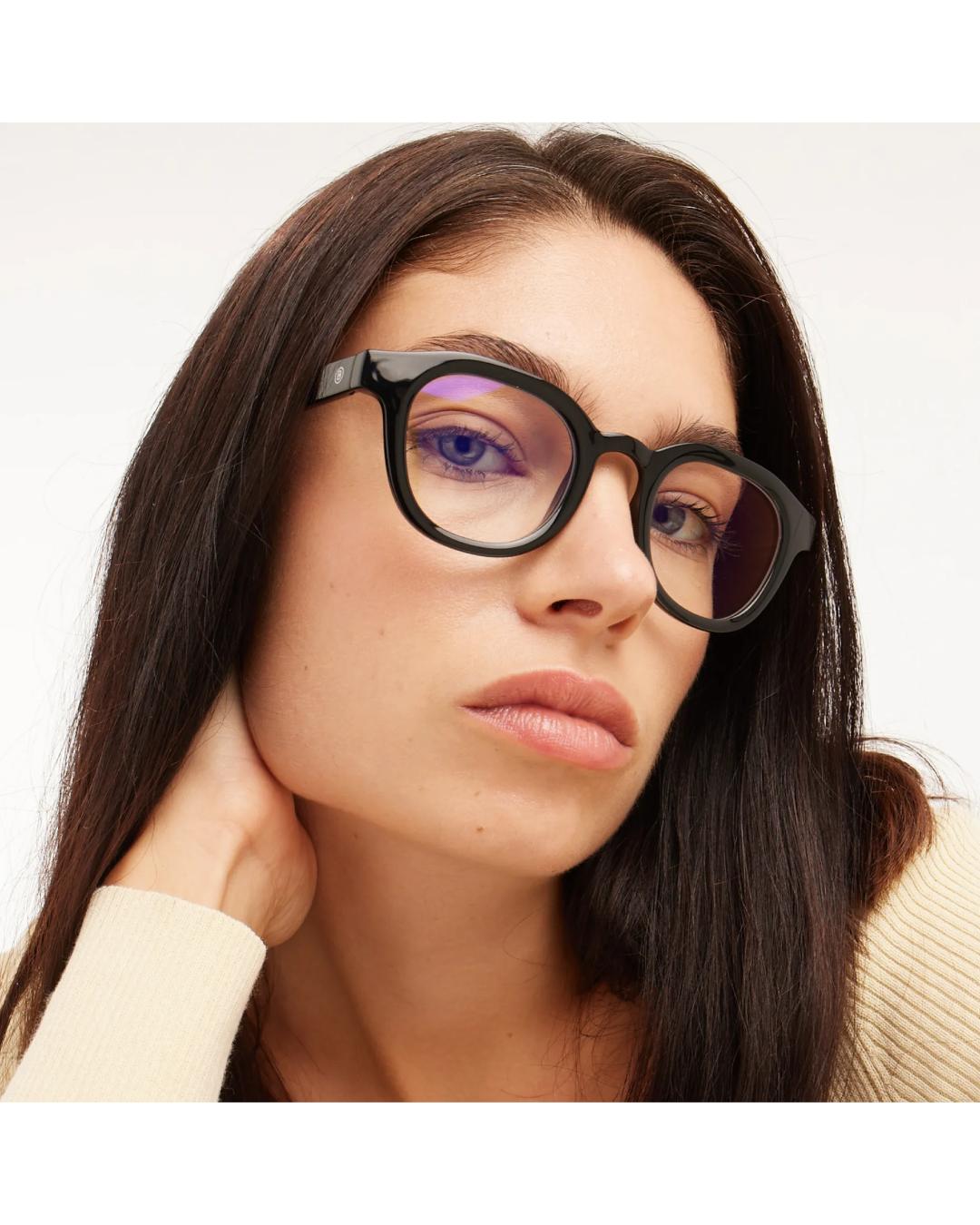 eyeglasses with a black lense