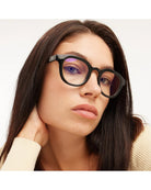eyeglasses with a black lense