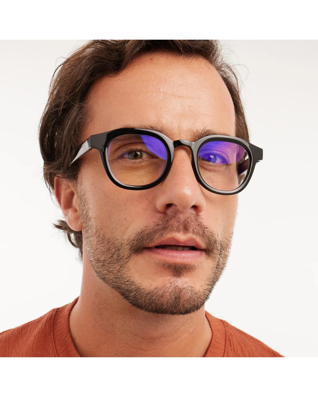 eyeglasses with a black lense