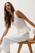 kbit white tank top with peplum bottom