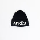 black hat and mitts that say apres ski
