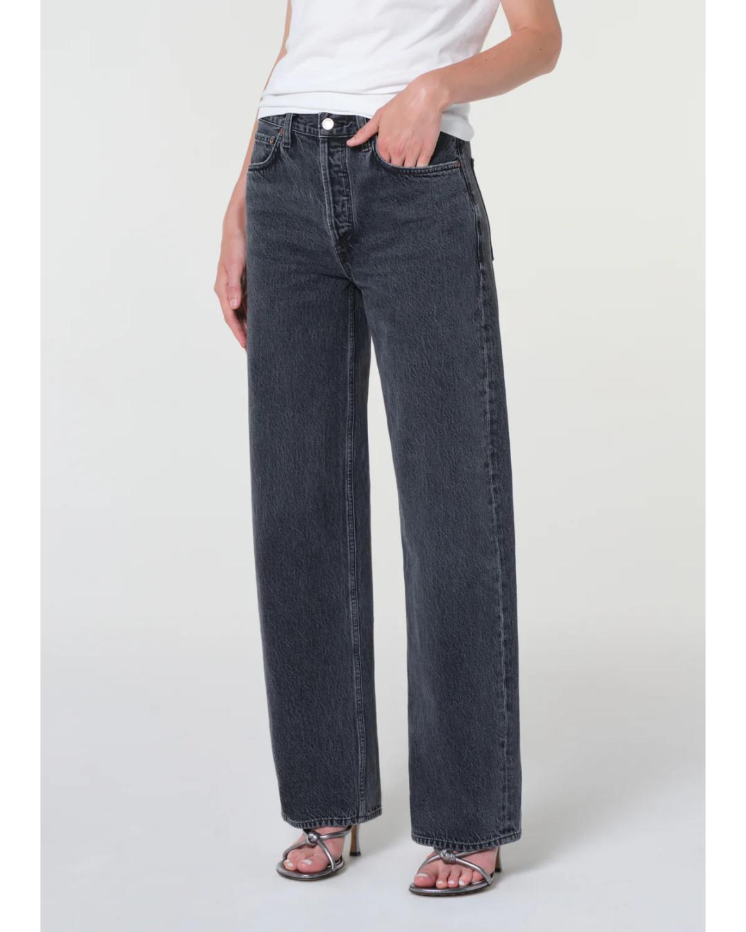 washed black denim pant with a curve leg