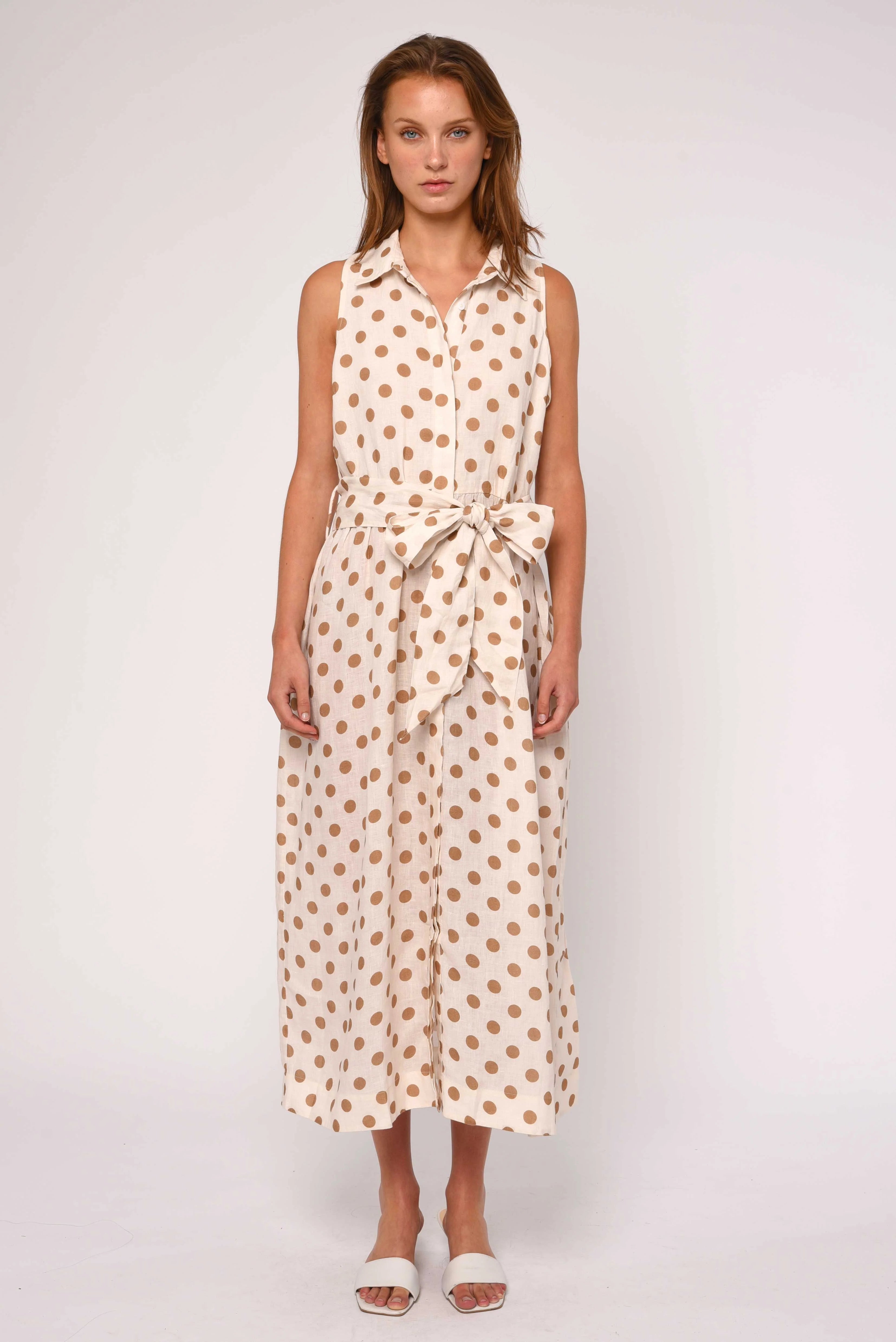 midi polka dot dress in cream and brown with a tie around the waist