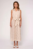midi polka dot dress in cream and brown with a tie around the waist