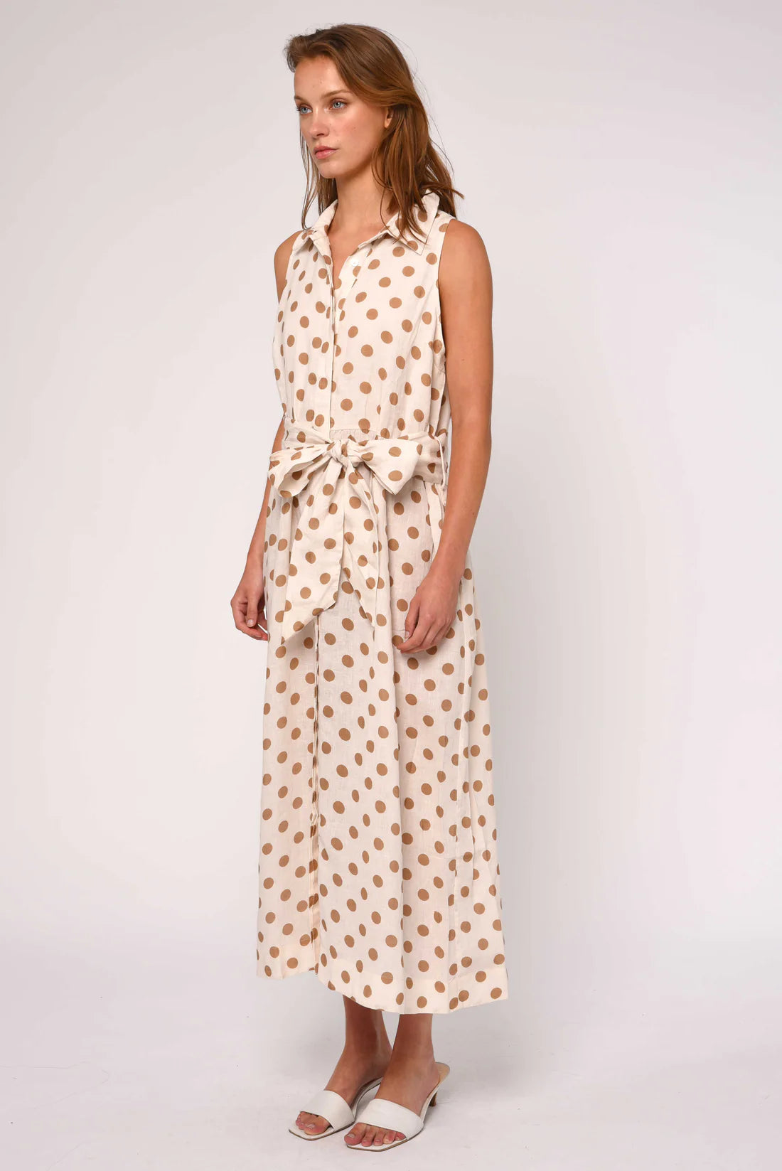 midi polka dot dress in cream and brown with a tie around the waist