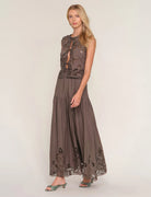 two piece set in brown with eyelet top and eyelet midi skirt