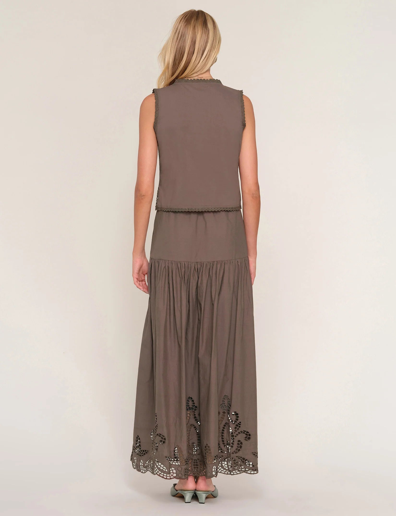 two piece set in brown with eyelet top and eyelet midi skirt