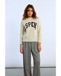 cream sweater with aspen written on the front
