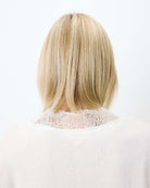 cream knit v-neck sweater with lace trim around neck