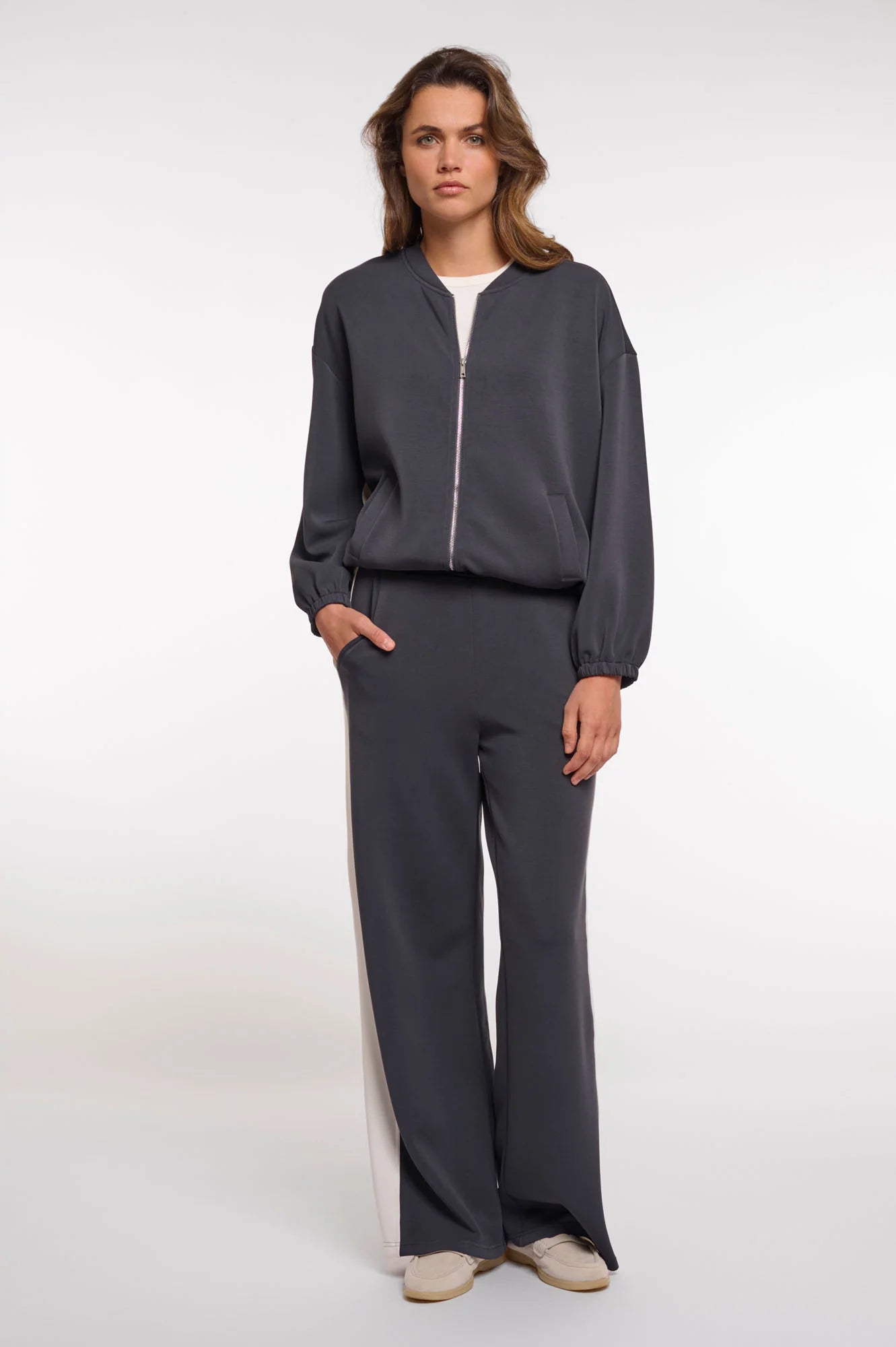 wide leg pant in dark navy with a cream stripe down the side