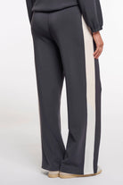 wide leg pant in dark navy with a cream stripe down the side