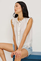 white sleeveless blouse