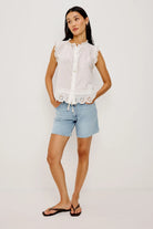 white sleeveless blouse
