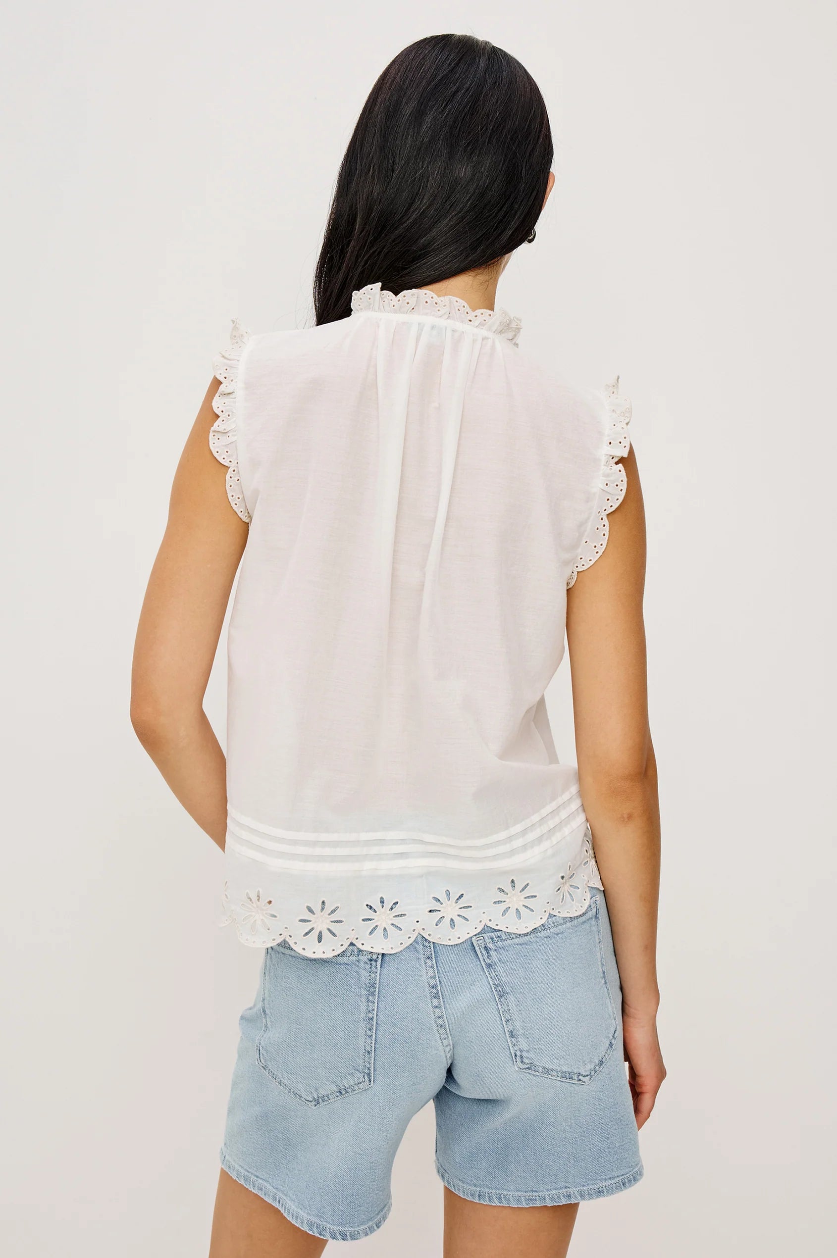 white sleeveless blouse