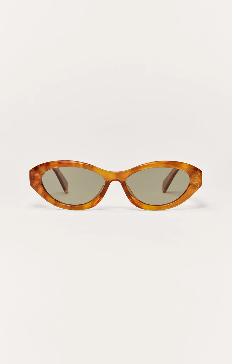 light tortoise oval sunglasses