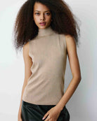 sleeveless gold knit top with tie at the back
