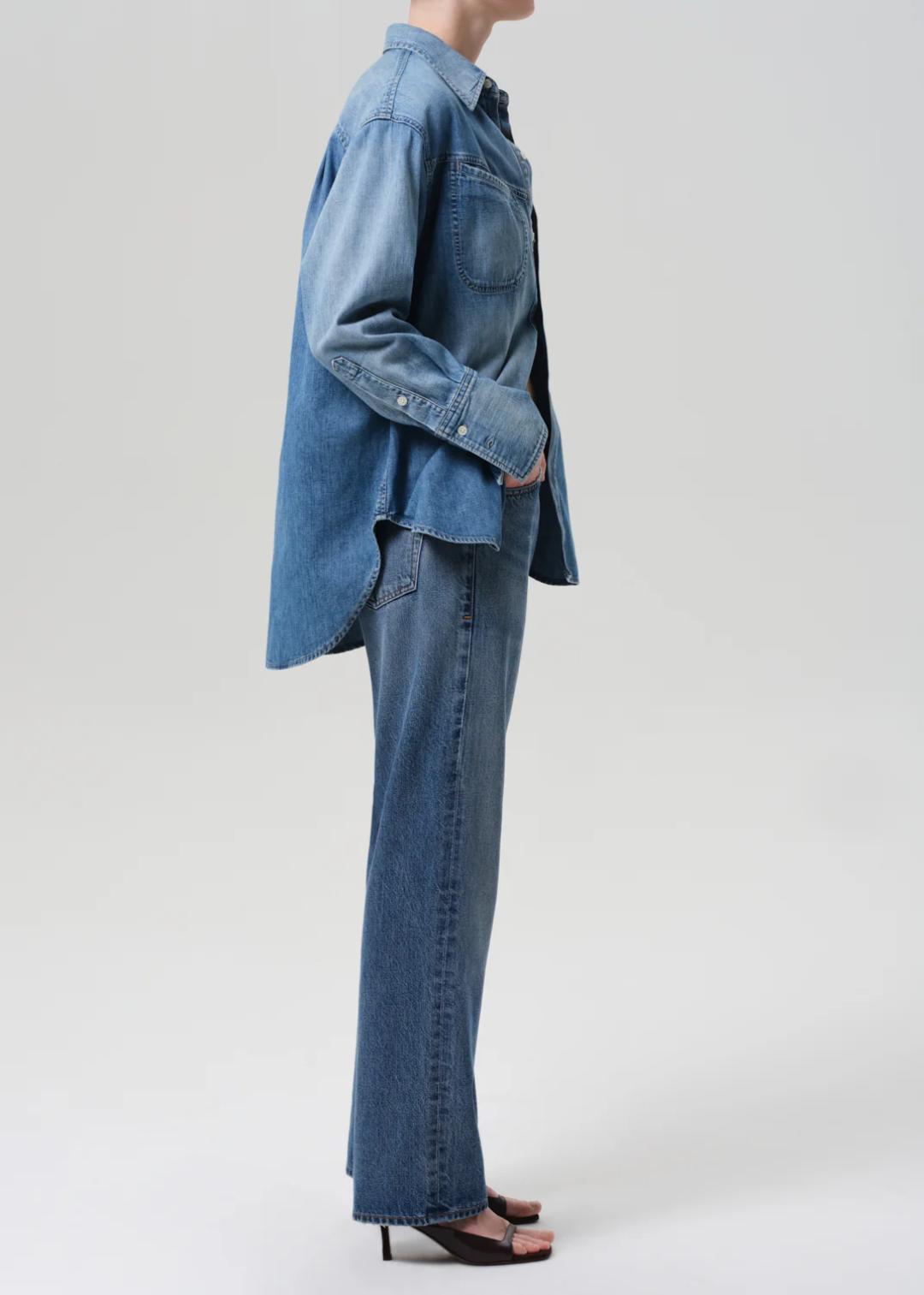 side view of blue denim straight leg pant