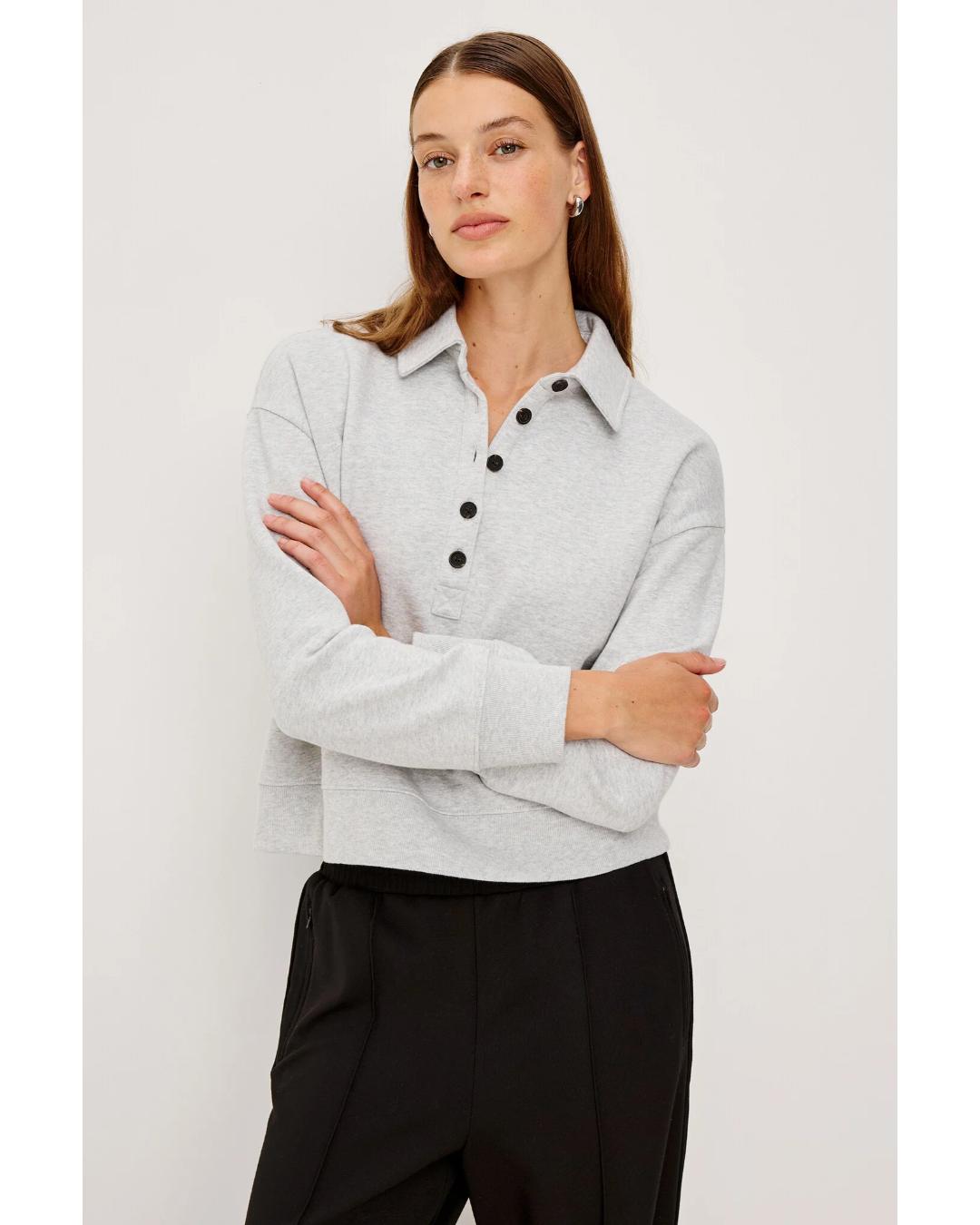 grey sweatshirt with collar and buttons down halfway 