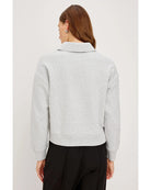 grey sweatshirt with collar and buttons down halfway 