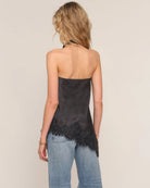 black cowl neck tank top with lace trim and a bias bottom