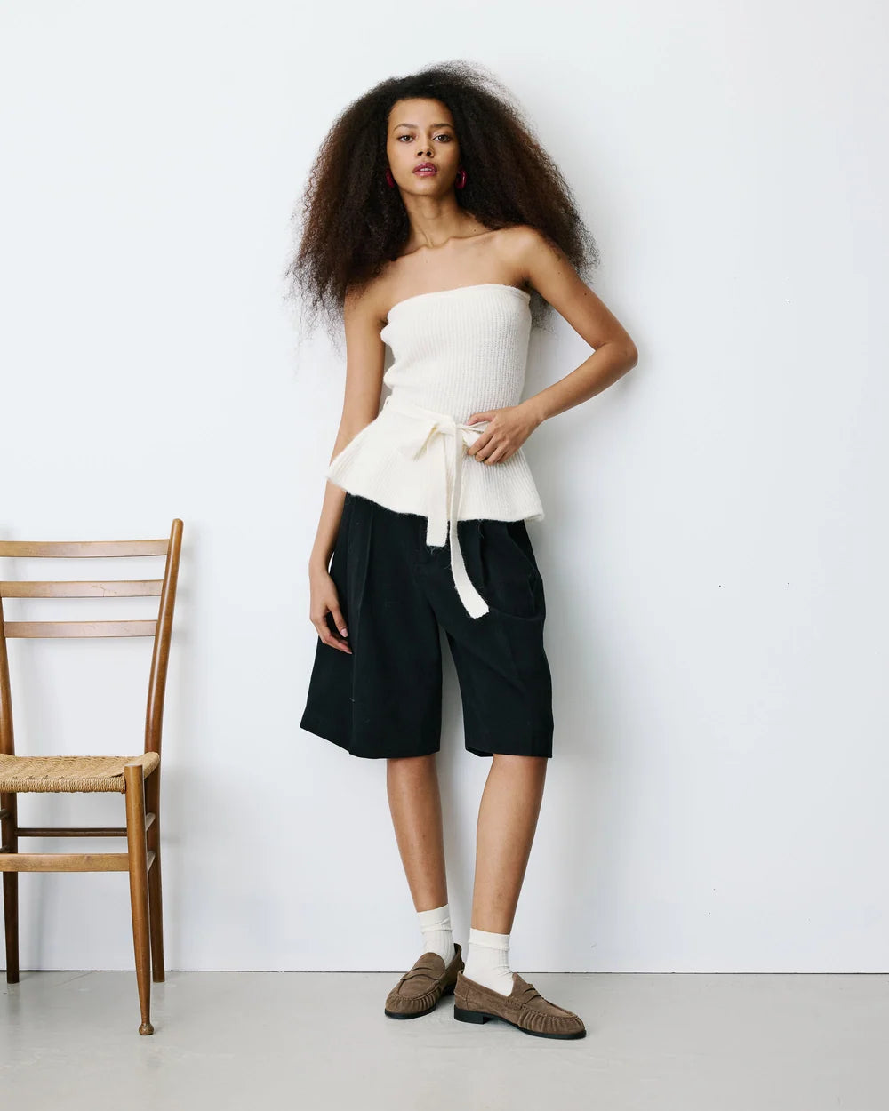 strapless tube top in white with peplum bottom and tie around the waist