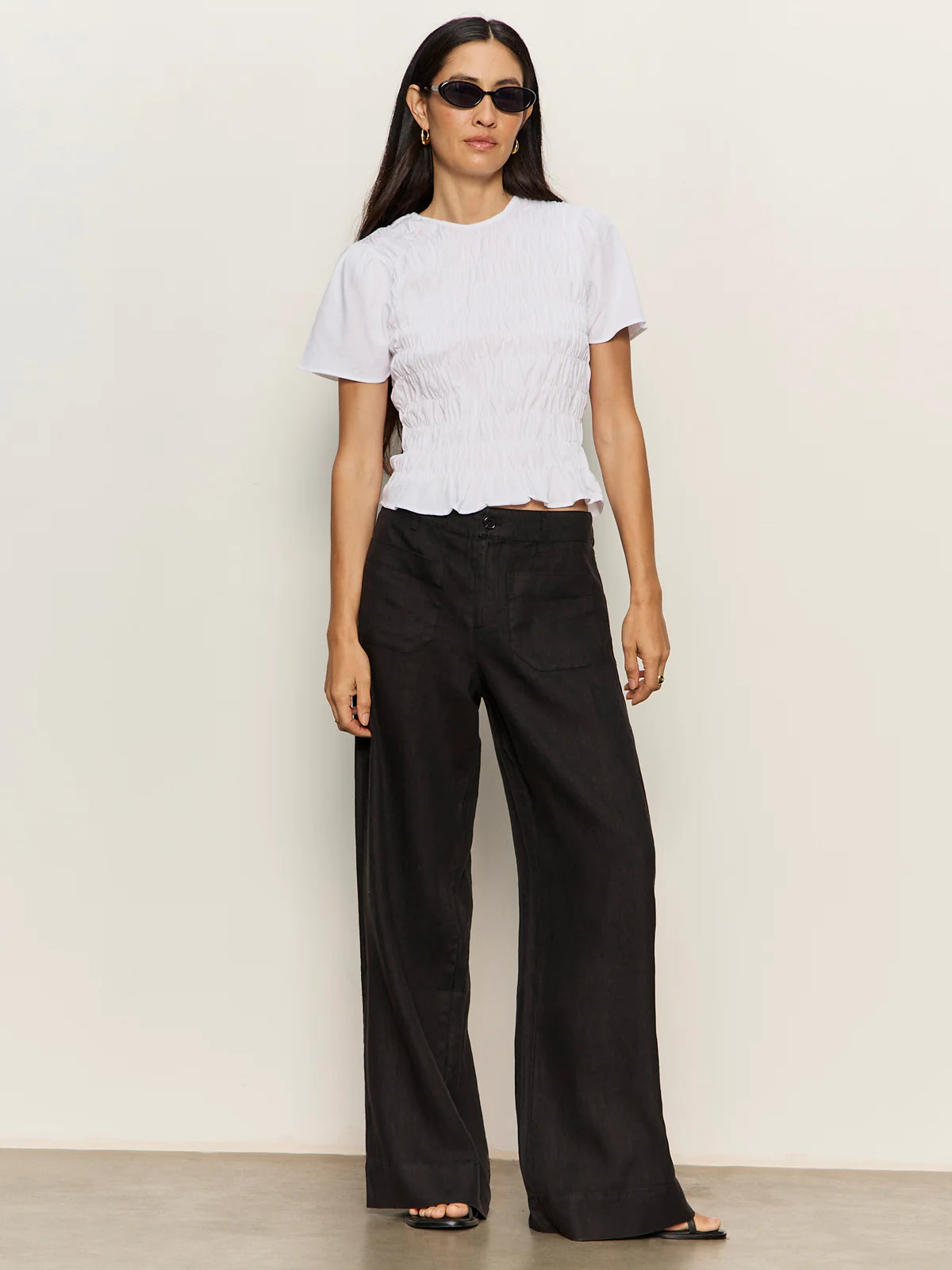 white top with smocking around the waist