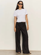 white top with smocking around the waist