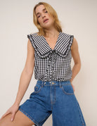 black gingham sleeveless top with large collar