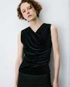 black velvet sleeveless top